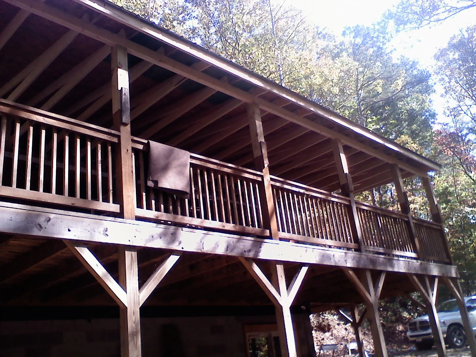 Timber framing under a new elevated porch and deck — Roof Leak Repair in Maineville by Roofing Brothers